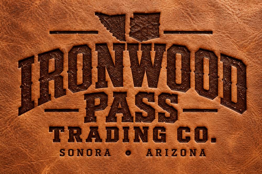 The Ironwood Pass mark pressed into leather